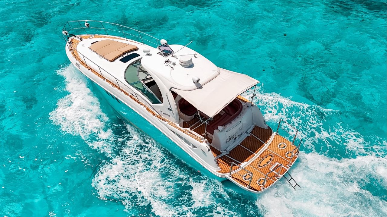 Private yacht cruising the Caribbean turquoise waters